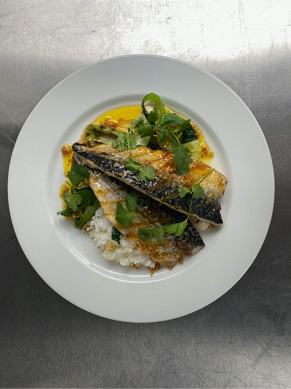 British mackerel fillets with marmalade, sticky rice, bok choi charred spring onions ginger and soy